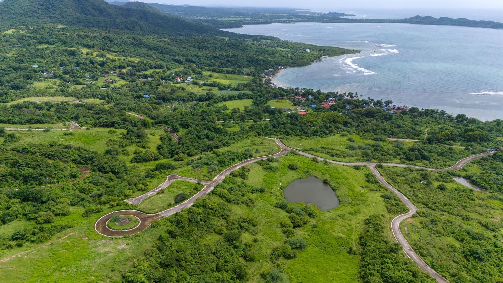 Green rolling terrain and roads inside the estate